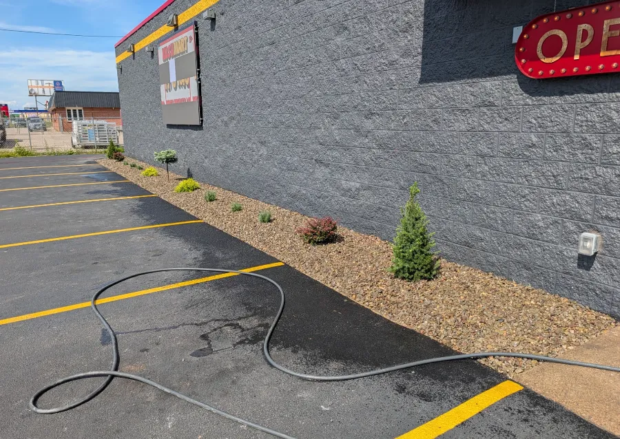 Decorative stone beds and new shrubs at a commercial property