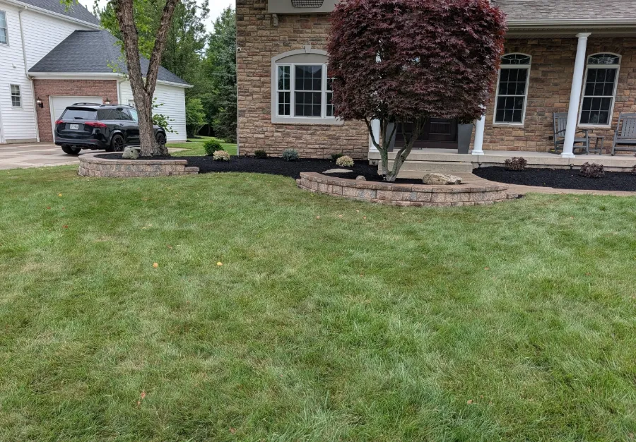 Front yard renovation with new beds, walls and sod in Grand Island, NY