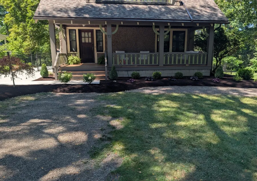 Fresh landscaping around a front porch in West Seneca, NY