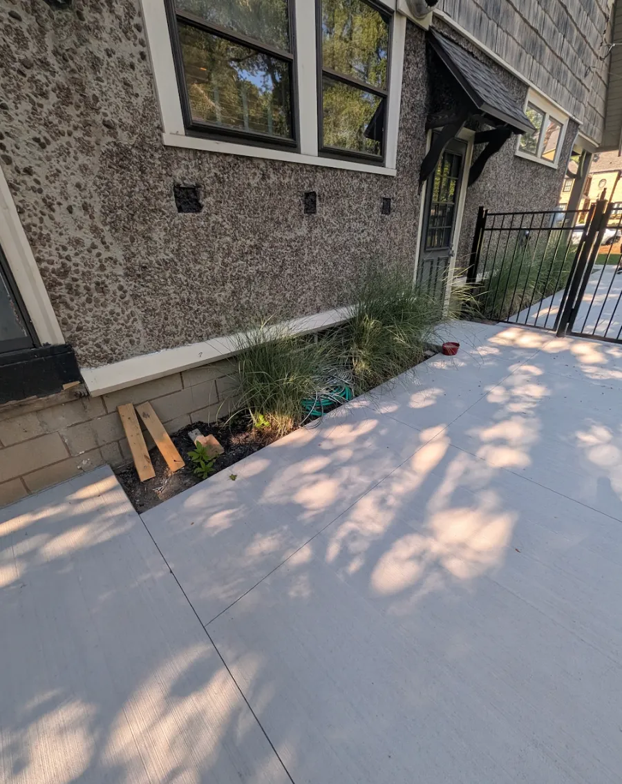Old landscaping before tear-out in West Seneca, NY